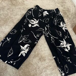 Ophelia roe. Medium floral black ankle pants.